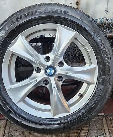 Комплект колес на BMW: легкосплавные диски + зимние шины - Диски — 1