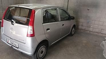 mini cuper: Daihatsu Cuore: 2003 г., 1 л, Механика, Бензин, Хэтчбэк — 3