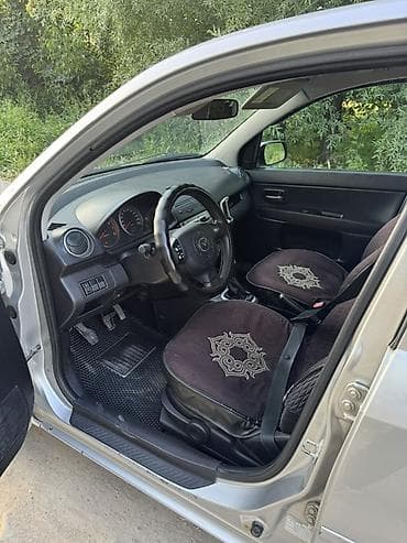мазда катела: Mazda 2: 2006 г., 1.4 л, Механика, Газ, Хэтчбэк — 9