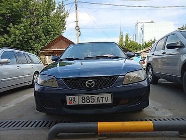 e2 byd: Mazda 323: 2002 г., 1.6 л, Механика, Бензин, Универсал — 3