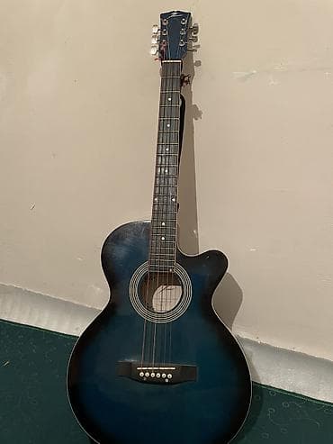 Комузы: Акустическая гитара с вырезом (cutaway), корпус формата — 1