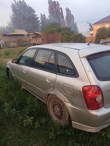 Mazda Familia: 2003 г., Универсал — 3