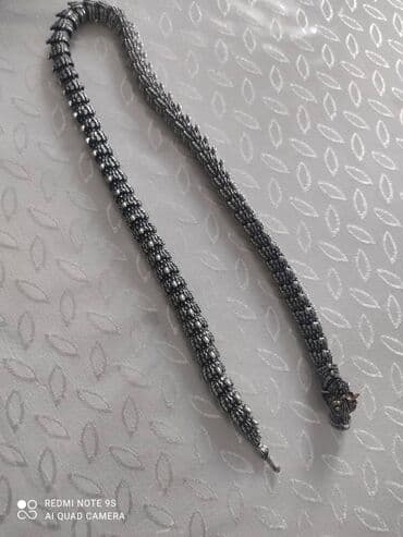 диадема ободок: Эффектный цепь в виде змеи, выполненный из металла с детализированной — 1