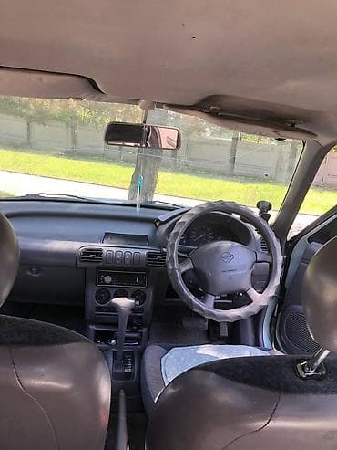 сиденья на голф: Nissan March: 1996 г., Автомат, Бензин, Хэтчбэк — 1