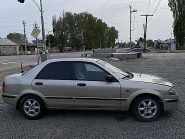 бампер мазда демио 2004: Mazda 323: 1998 г., 1.5 л, Механика, Бензин, Седан — 3