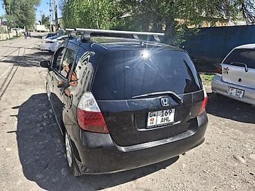 diska 14: Honda Fit: 2005 г., Хэтчбэк — 4