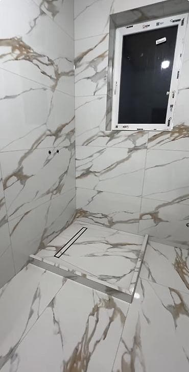 Укладка керамогранита и плитки “под мрамор” под ключ -