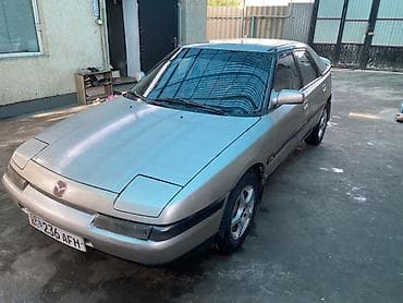Mazda 323: 1991 г., 1.8 л, Механика, Бензин, Лифтбек — 2