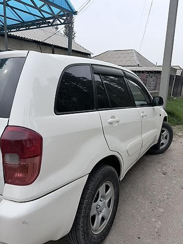 перья: Toyota RAV4: 2002 г., 2 л, Автомат, Бензин, Кроссовер — 3