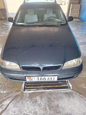 бутка машина: Toyota Caldina: 1997 г., Механика, Бензин, Универсал — 2