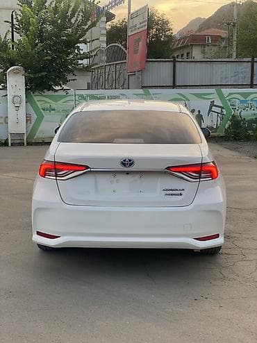 volvo 940: Toyota Corolla: 2021 г., 1.8 л, Автомат, Гибрид, Седан — 3