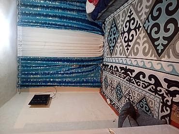 Дом с участком Одноэтажный частный дом с двускатной крышей и двумя