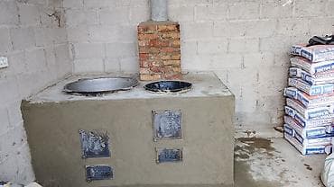 Уличная дровяная печь-очаг с двумя конфорками (под казан и котел) -