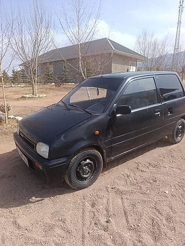 тонерофка на авто: Daihatsu Mira: 1991 г., Механика, Бензин, Хэтчбэк — 1