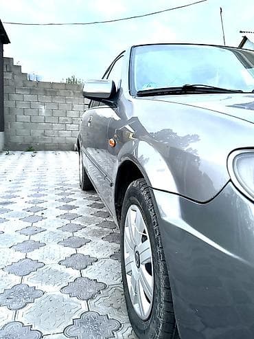 ресор масквич: Mazda 323: 2002 г., 1.6 л, Механика, Бензин, Хэтчбэк — 7