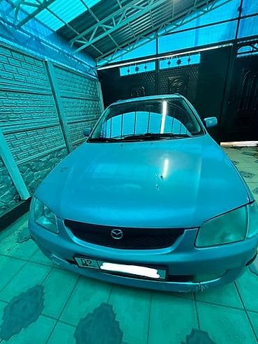мазда хронос: Mazda 323: 2000 г., 1.5 л, Механика, Бензин, Хэтчбэк — 7