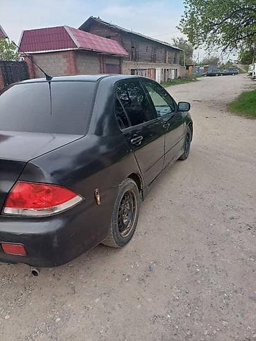 lanser 10: Mitsubishi Lancer: 2003 г., 1.6 л, Автомат, Бензин, Седан — 5