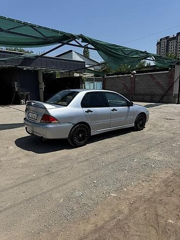 митсубиси оутлендер: Mitsubishi Lancer: 2003 г., 1.3 л, Механика, Бензин, Седан — 4