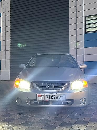 именные рамки на авто: Продаётся седан Kia Cerato серебристого цвета. Автомобиль 4-дверный — 3