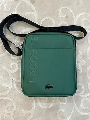 Барсетка Lacoste. Размер 20 x 18 тетрадь помещается. Материал плотный