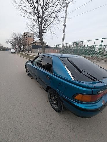 mx 5: Mazda 323: 1992 г., 1.6 л, Автомат, Бензин, Хэтчбэк — 9