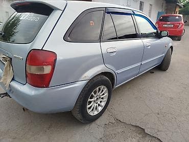 демио 2000: Mazda 323: 2003 г., 1.6 л, Механика, Бензин, Универсал — 4