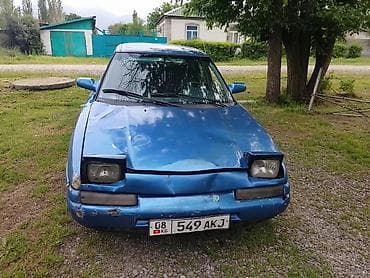 Транспорт: Mazda 323: 1990 г., Седан — 3