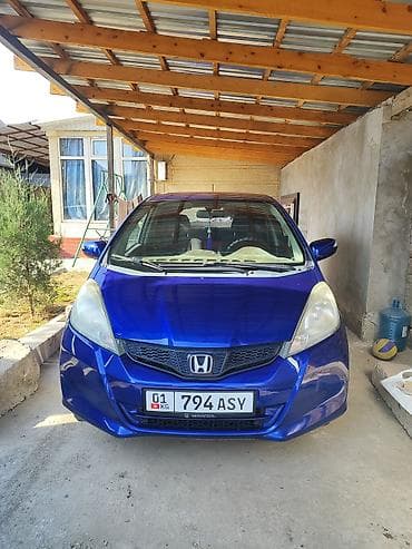 golf v: Honda Jazz: 2011 г., 1.3 л — 1