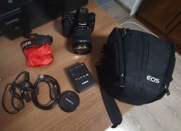 Canon EOS 70D с объективом Canon EF‑S 18–135mm f/3.5–22 IS STM. В