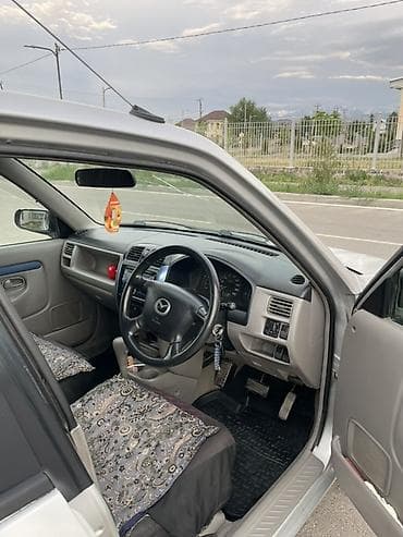 мереке авто слиф: Mazda Demio: 2001 г., 1.5 л, Автомат, Бензин, Хэтчбэк — 6