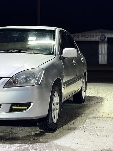 01: Mitsubishi Lancer: 2004 г., 1.6 л, Автомат, Бензин, Седан — 5
