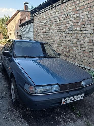 audi а4: Mazda 626: 1990 г., Седан — 2