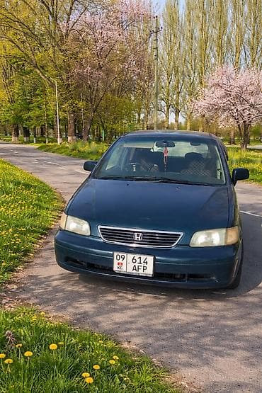 сиденья на хонда: Honda Odyssey: 1995 г., 2.2 л, Автомат, Бензин, Минивэн — 1
