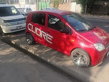 лифтбек: Daihatsu Cuore: 2004 г., 1 л, Механика, Бензин, Лифтбек — 1