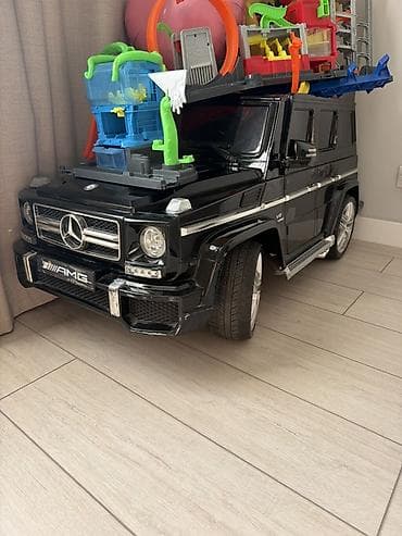 Детский электромобиль Mercedes-Benz G-Class (AMG-стиль), черный at lalafo.kg Детский электромобиль Mercedes-Benz G-Class (AMG-стиль), черный