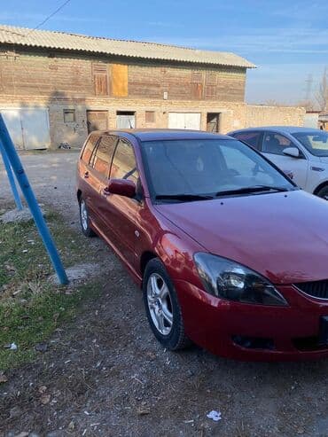 дом на калесох: Mitsubishi Lancer: 2003 г., 1.6 л, Механика, Бензиновая, Универсал — 4