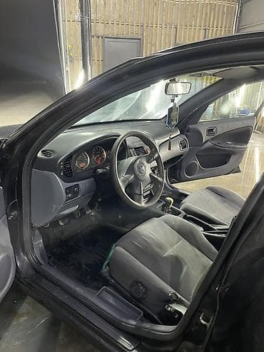 машины на механике: Nissan Almera: 2005 г., 1.5 л, Механика, Бензин, Седан — 6