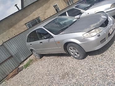 тюнинг авто: Mazda Familia: 2001 г., Механика, Бензин, Хэтчбэк — 2
