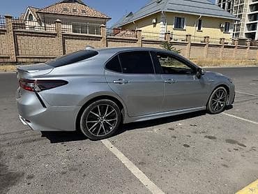тайота из: Toyota Camry: 2021 г., 2.5 л, Автомат, Гибрид, Седан — 3