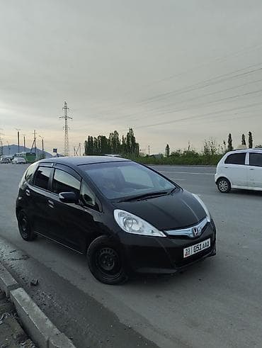 li l6: Honda Fit: 2013 г., Вариатор, Гибрид, Хэтчбэк — 1