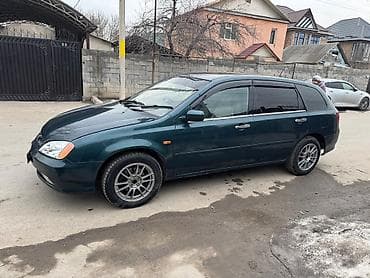 я ищу степ вагон: Просторный универсал темно-зелёного цвета с тонированными стёклами — 7