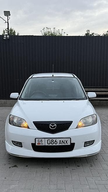 Mazda Demio: 2003 г., 1.3 л, Автомат, Бензин, Хэтчбэк