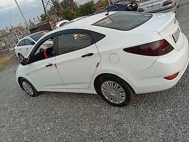bvd e2: Hyundai Solaris: 2013 г., Бензин, Седан — 4