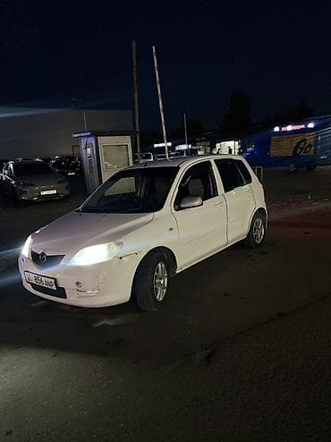 Продажа авто: Mazda Demio: 2003 г., 1.3 л, Автомат, Бензин, Хэтчбэк — 1