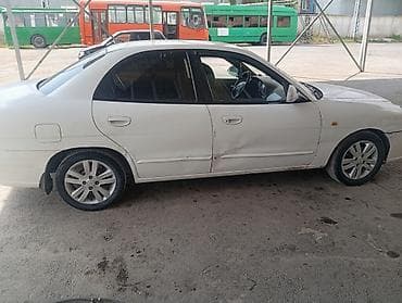 audi s 4: Daewoo Nubira: 2002 г., Механика, Седан — 1