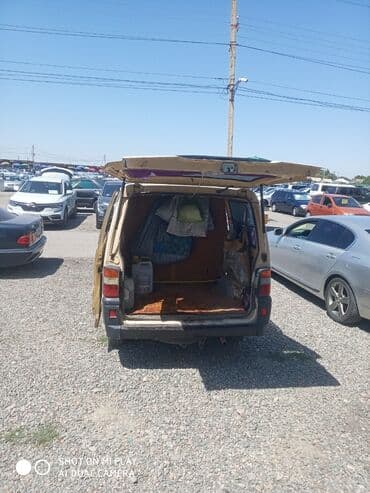 некия 1: Mitsubishi L300: 1988 г., 2 л, Механика, Бензин, Минивэн — 4