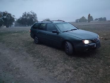 наклейки на авто: Nissan Primera: 1999 г., 2 л, Автомат, Газ, Универсал — 2