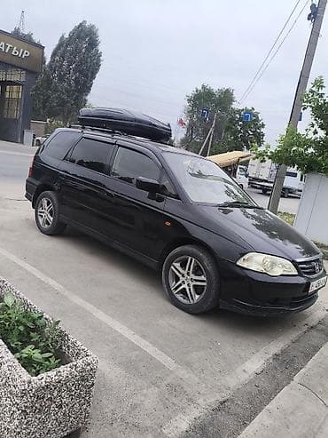 универса: Honda Odyssey: 2001 г., 2.3 л, Автомат, Бензин, Универсал — 1