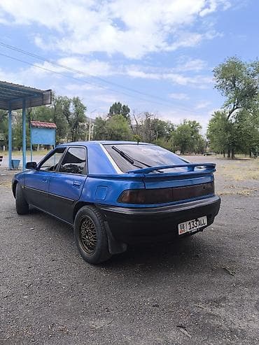 обмен на сапок: Mazda 323: 1994 г., 1.8 л, Механика, Бензин, Хэтчбэк — 9