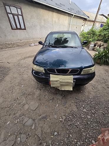 Daewoo Nubira: 1997 г., 2 л, Механика, Бензин, Седан